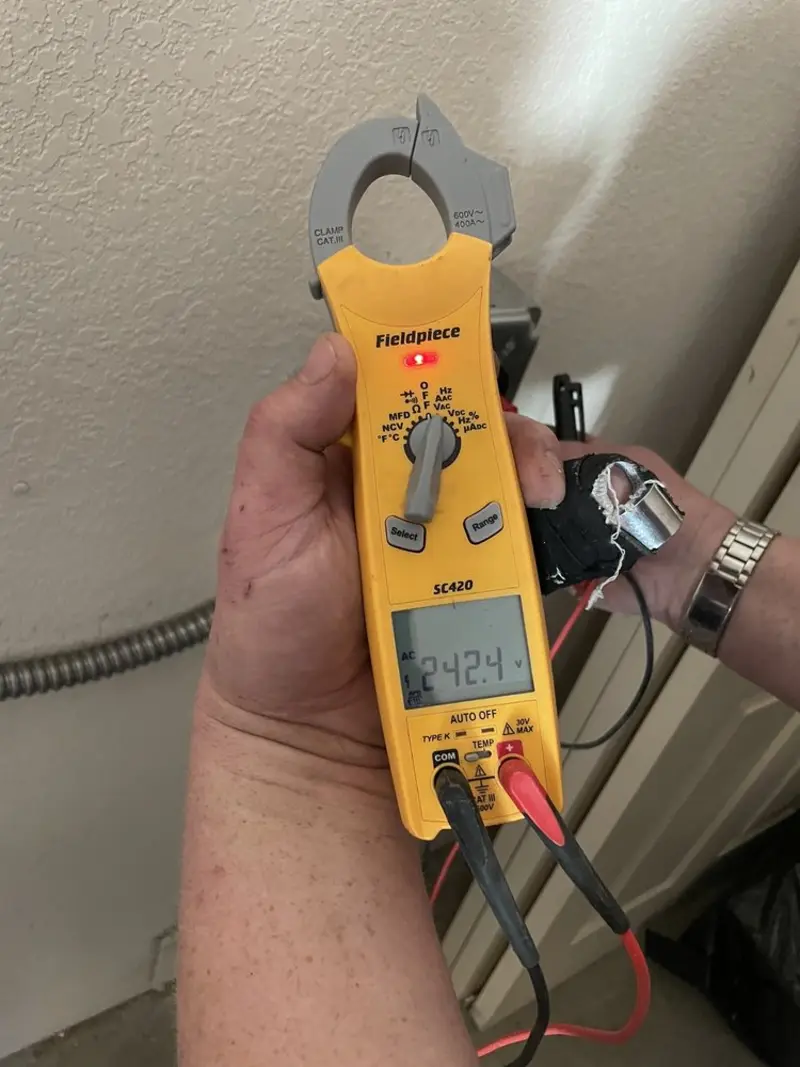 Voltage testing with clamp meter during Ceiling Fan Installation in Columbiana